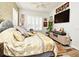 Large bedroom with stylish decor, big windows and a flat screen TV at 601 Sycamore St # 6108, Celebration, FL 34747