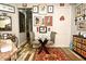 Small dining area with round table and two chairs at 601 Sycamore St # 6108, Celebration, FL 34747