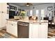 Kitchen island with granite countertops and sink at 601 Sycamore St # 6108, Celebration, FL 34747