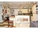 Kitchen with breakfast nook and custom cabinetry at 601 Sycamore St # 6108, Celebration, FL 34747