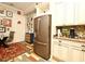 Bright kitchen features granite countertops, stainless steel appliances, and custom cabinetry at 601 Sycamore St # 6108, Celebration, FL 34747