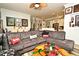 Living room with sectional sofa and coffee table at 601 Sycamore St # 6108, Celebration, FL 34747