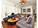 Relaxing living room, featuring comfortable sectional sofa and large windows at 601 Sycamore St # 6108, Celebration, FL 34747