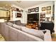 Living area with sectional sofa and large flat-screen TV at 601 Sycamore St # 6108, Celebration, FL 34747