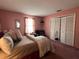 Bedroom with a double bed and built-in closet at 648 Tradewinds Dr, Deltona, FL 32738
