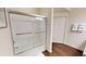 Bathroom with shower/tub combo and wood-look floors at 8906 Shine Dr, Kissimmee, FL 34747