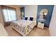 Bedroom with king-size bed and modern decor at 8906 Shine Dr, Kissimmee, FL 34747
