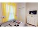 Mickey Mouse themed bedroom with a dresser and TV at 8906 Shine Dr, Kissimmee, FL 34747
