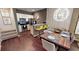 Open concept dining area and kitchen with modern wood dining table at 8906 Shine Dr, Kissimmee, FL 34747