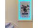 A unique Mickey Mouse themed wall art decorates the stairwell at 8906 Shine Dr, Kissimmee, FL 34747