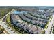 Aerial view of Windsor at Westside community with lake and numerous houses at 8953 Zurich Ln, Kissimmee, FL 34747