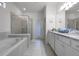 Large bathroom with soaking tub and walk-in shower at 8953 Zurich Ln, Kissimmee, FL 34747