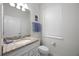 Bathroom with single vanity and granite countertop at 8953 Zurich Ln, Kissimmee, FL 34747