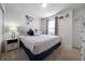 King-size bed in a spacious bedroom with Up themed decor at 8953 Zurich Ln, Kissimmee, FL 34747