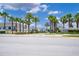 Palm trees line the entrance to Windsor at Westside at 8953 Zurich Ln, Kissimmee, FL 34747