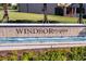 Community entrance with water feature and Windsor at Westside signage at 8953 Zurich Ln, Kissimmee, FL 34747