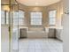 Large bathroom with soaking tub and double vanity at 900 Shorehaven Drive, Poinciana, FL 34759