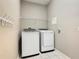 Bright laundry room, washer, dryer included at 900 Shorehaven Drive, Poinciana, FL 34759
