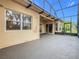Screened patio with view of backyard at 900 Shorehaven Drive, Poinciana, FL 34759