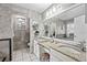 Bathroom featuring a large counter and decorative mirrors at 918 San Paulo Way, Kissimmee, FL 34758