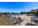 Spacious community pool with comfortable lounge chairs and a sunny atmosphere at 918 San Paulo Way, Kissimmee, FL 34758