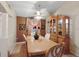 Formal dining room with a large wooden table and hutch at 918 San Paulo Way, Kissimmee, FL 34758