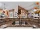 A double sink with granite counters and a view of the outdoors at 918 San Paulo Way, Kissimmee, FL 34758