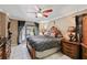 The main bedroom features a large bed and decorative furniture at 918 San Paulo Way, Kissimmee, FL 34758