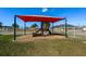 Neighborhood playground with shade and a variety of play equipment at 918 San Paulo Way, Kissimmee, FL 34758
