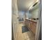 Bathroom with double vanity and shower/tub combo at 1068 Lake Berkley Dr, Kissimmee, FL 34746