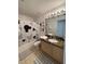 Mickey Mouse themed bathroom at 1068 Lake Berkley Dr, Kissimmee, FL 34746