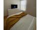 Bedroom with a double bed, dresser, and TV at 1068 Lake Berkley Dr, Kissimmee, FL 34746