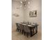 Elegant dining room featuring a dark wood table and six chairs at 1068 Lake Berkley Dr, Kissimmee, FL 34746