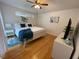 Large main bedroom with wood floors and plenty of natural light at 1068 Lake Berkley Dr, Kissimmee, FL 34746