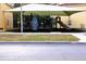 Covered playground with slides and climbing wall at 1068 Lake Berkley Dr, Kissimmee, FL 34746
