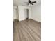 Bedroom with wood-look floors and a large closet at 1075 S Hiawassee Rd # 912, Orlando, FL 32835