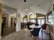 Community room with seating, tables, and high ceilings at 1075 S Hiawassee Rd # 912, Orlando, FL 32835