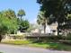 Tradewinds community entrance with lush landscaping at 1075 S Hiawassee Rd # 912, Orlando, FL 32835