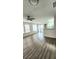 Spacious living room with wood-look floors at 1075 S Hiawassee Rd # 912, Orlando, FL 32835