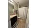 Clean bathroom with shower/tub combo and tan floor at 120 Panda Way, Davenport, FL 33837