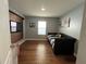Bedroom with wood-paneled accent wall and daybed at 120 Panda Way, Davenport, FL 33837