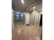 Bright entryway with tile flooring and neutral-colored walls at 120 Panda Way, Davenport, FL 33837