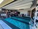 Garage with teal flooring and storage at 120 Panda Way, Davenport, FL 33837