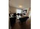 Spacious living room with dark blue velvet furniture at 120 Panda Way, Davenport, FL 33837