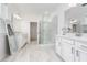 Spa-like Primary bathroom with a large shower and double vanity at 12549 Encore At Ovation Way, Winter Garden, FL 34787