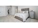 Comfortable bedroom with plush bed and ample closet space at 12549 Encore At Ovation Way, Winter Garden, FL 34787
