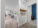 Bright entryway with open view to kitchen and convenient drop zone at 12549 Encore At Ovation Way, Winter Garden, FL 34787