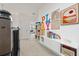 Fun ' play area with colorful decor and built-in shelving at 12549 Encore At Ovation Way, Winter Garden, FL 34787