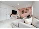 Relaxing recreation room with comfy seating and large TV at 12549 Encore At Ovation Way, Winter Garden, FL 34787