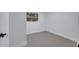 Well-lit bedroom with grey flooring and white walls at 1414 Vonderay Rd, Orlando, FL 32825